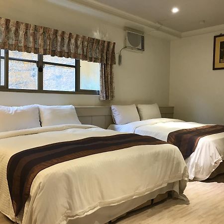 Minren Hotel Юйчі Екстер'єр фото