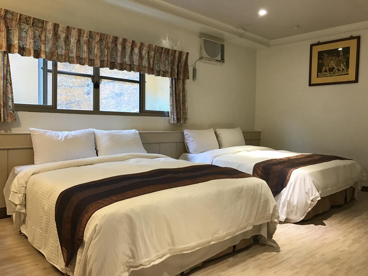 Minren Hotel Юйчі Екстер'єр фото