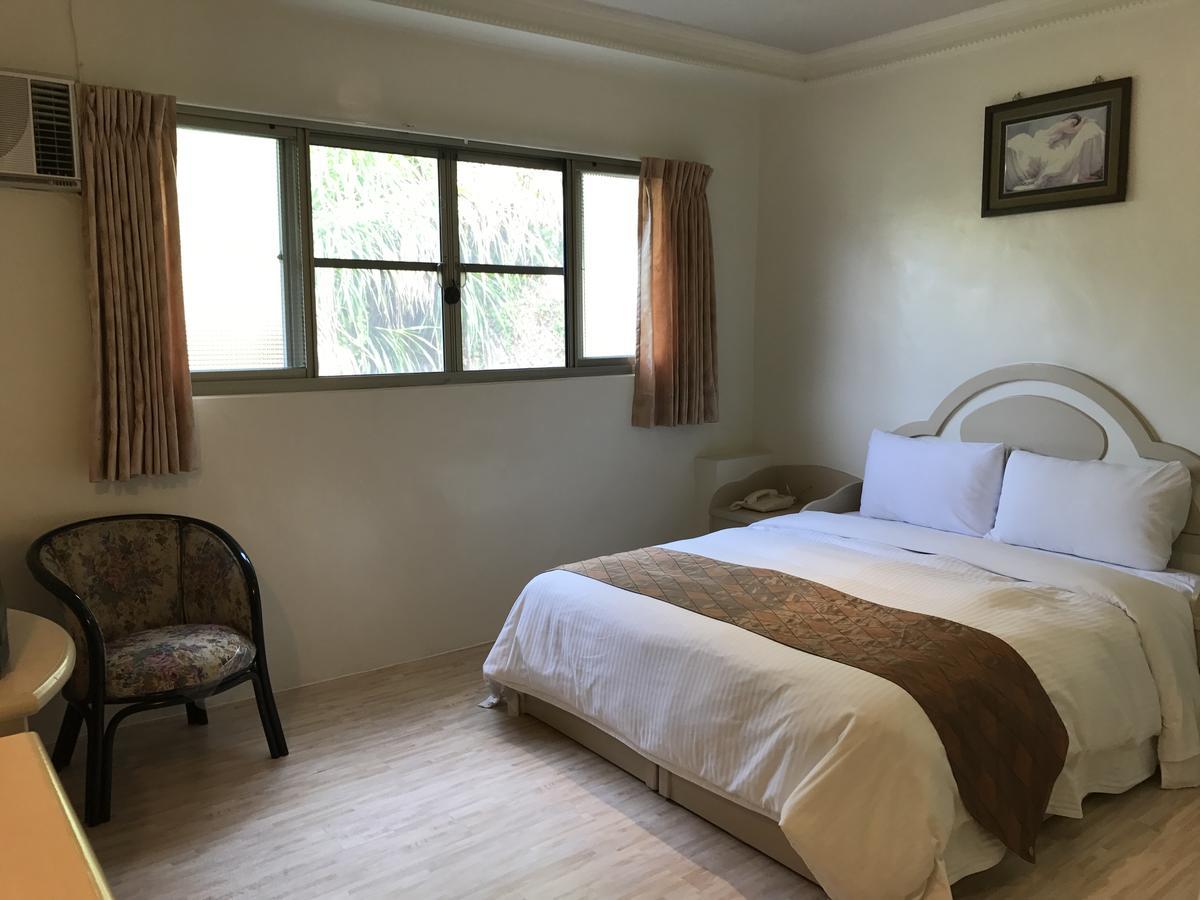 Minren Hotel Юйчі Екстер'єр фото