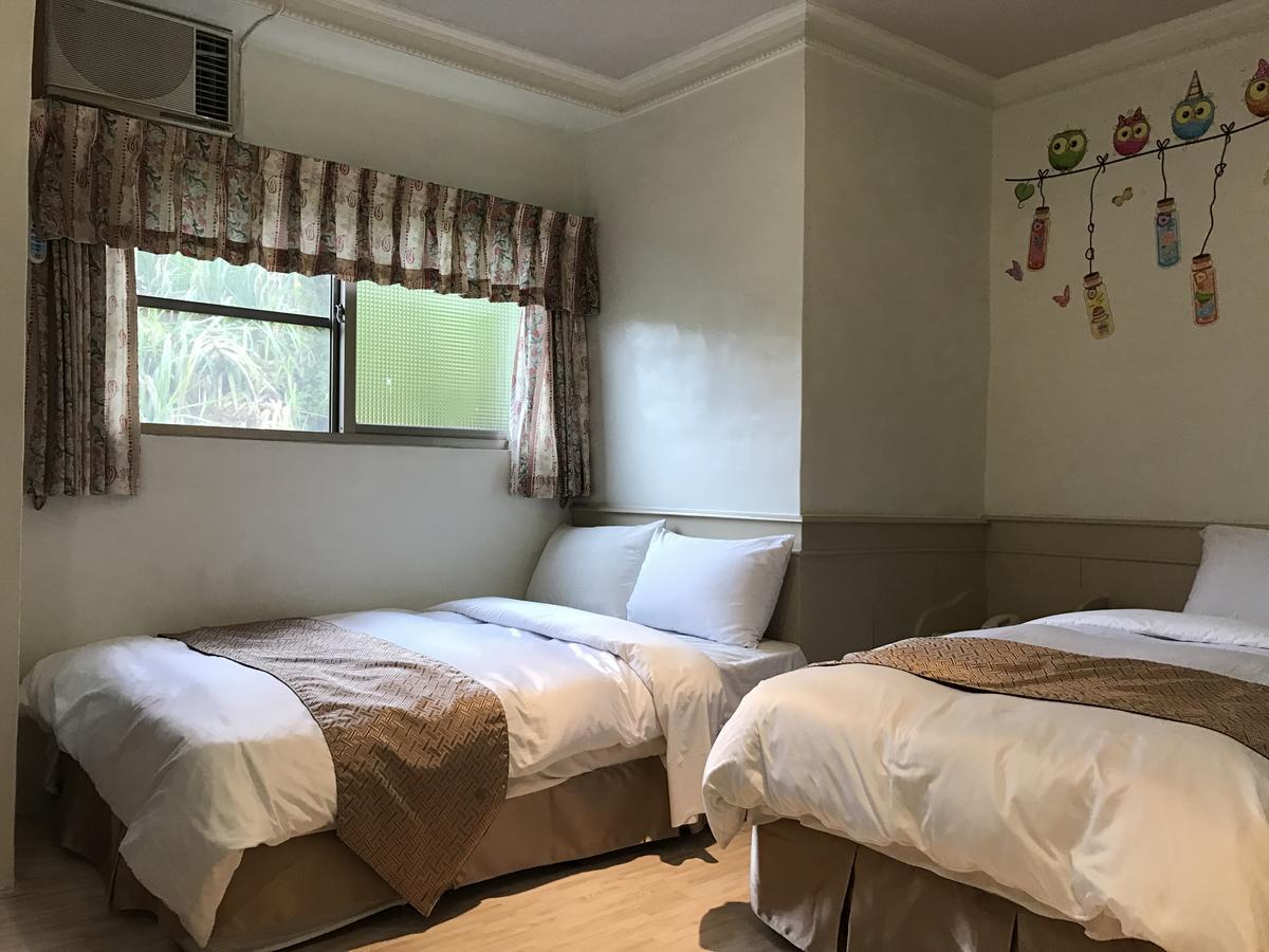 Minren Hotel Юйчі Екстер'єр фото