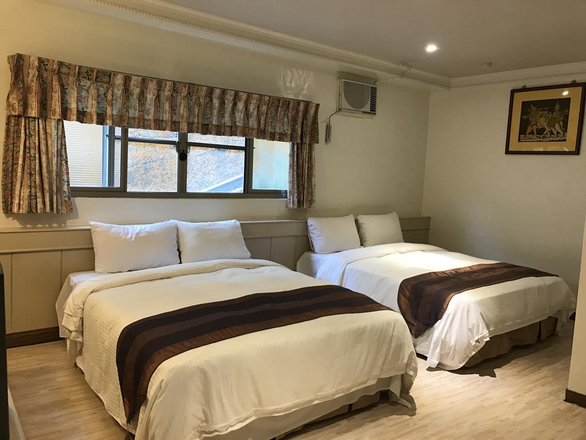 Minren Hotel Юйчі Екстер'єр фото