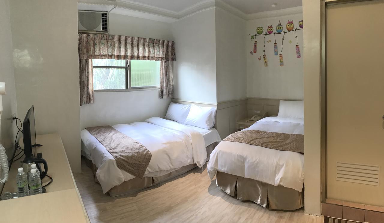 Minren Hotel Юйчі Екстер'єр фото